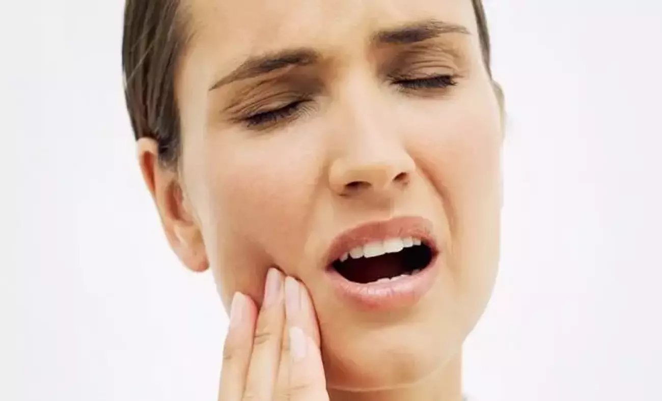 What is a dental abscess and how does it form?